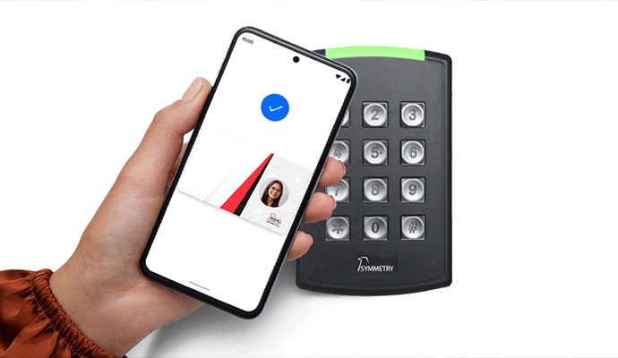 A smartphone unlocks a Symmetry keypad.