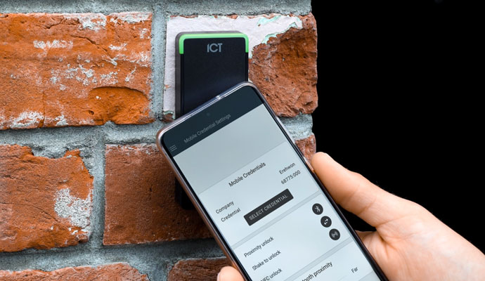 A smartphone unlocks an ICT reader.