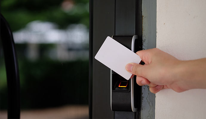White keycard at door reader