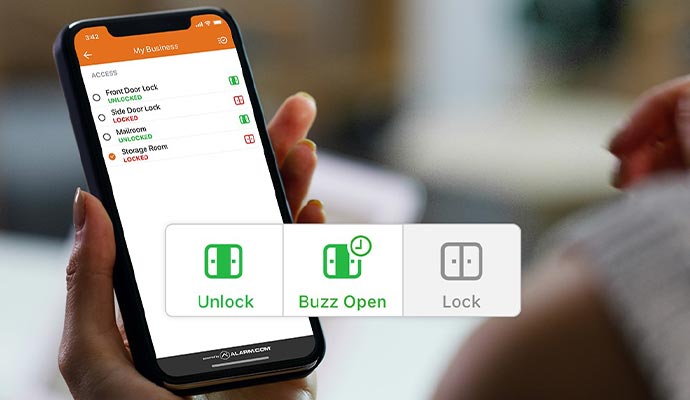 A person controlling touchless door using smartphone app
