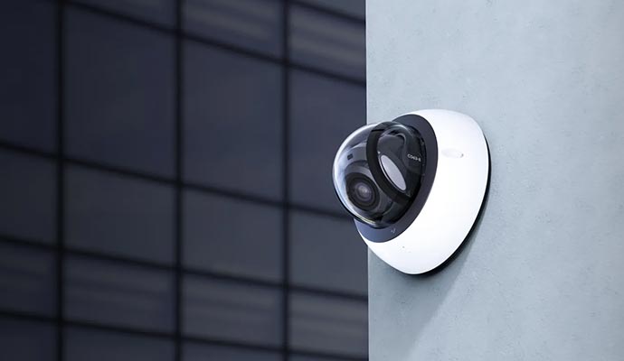 Modern white dome-style security camera
