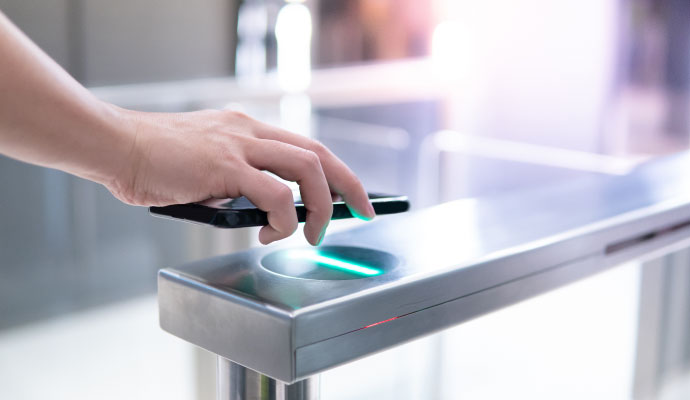 A person using a touchless door system 