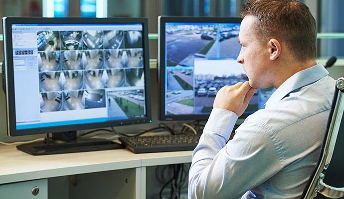 Security professional monitoring daily operations