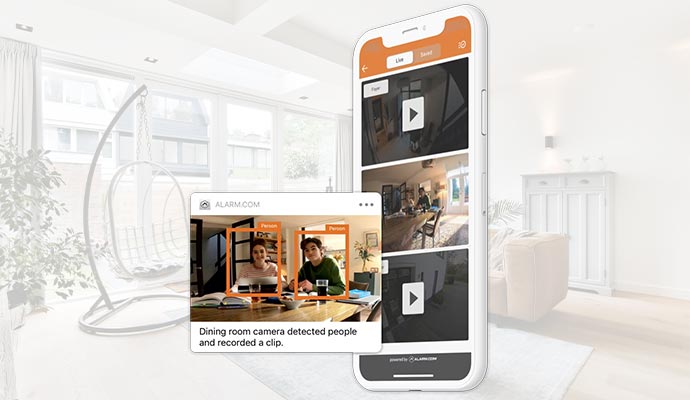 Smartphone displays a security app with video clips